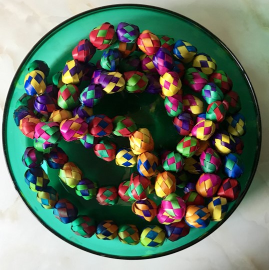 Mexico 1492 - Extra large, emerald green salad bowl, made out of hand blown glass, filled with colorful palm leaf garland