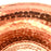 Mexico 1492: A hammered copper saucepan (or better known as cazo in Mexico), handmade in Santa Clara del Cobre, by one of the oldest, most respected coppersmith workshops of don Viduel. The copper hammering process is lengthy and arduous, but the shaping is done through a series of soft hammer blows that create the recognizable indentations on the surface. 