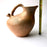 Mexico 1492: Stunning pitcher with an animal head ornament, made from red clay with a yellowish and gray tone and marked with random flame spots, adding character. Best for serving water, refreshing drinks, or even as a vase. Lead free, unglazed. Thanks to the artisanal nature of this handmade product, no two pieces are the same. 