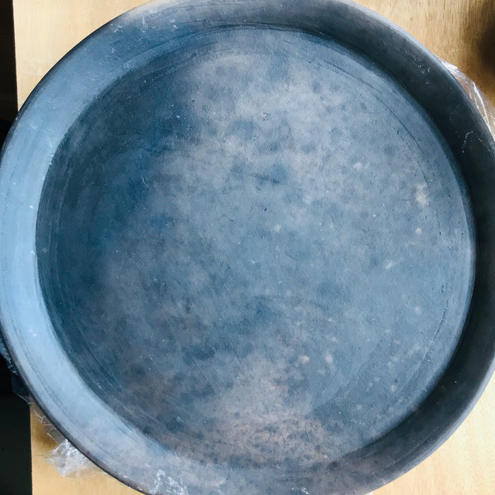 Mexico 1492 - Thick brown clay plates, with uneven, unpredictable patterns of smoke stains, that can just leave a light shade or cover the plate completely.