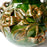 Green Glazed Clay Pitcher with Flower Ornaments