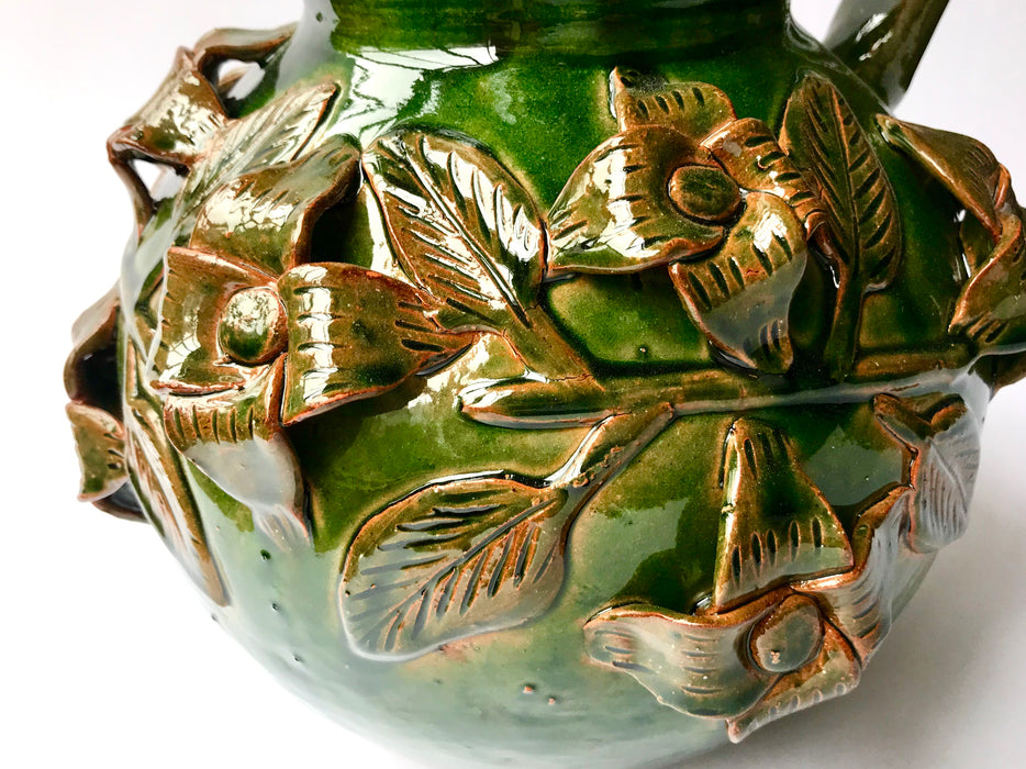Green Glazed Clay Pitcher with Flower Ornaments