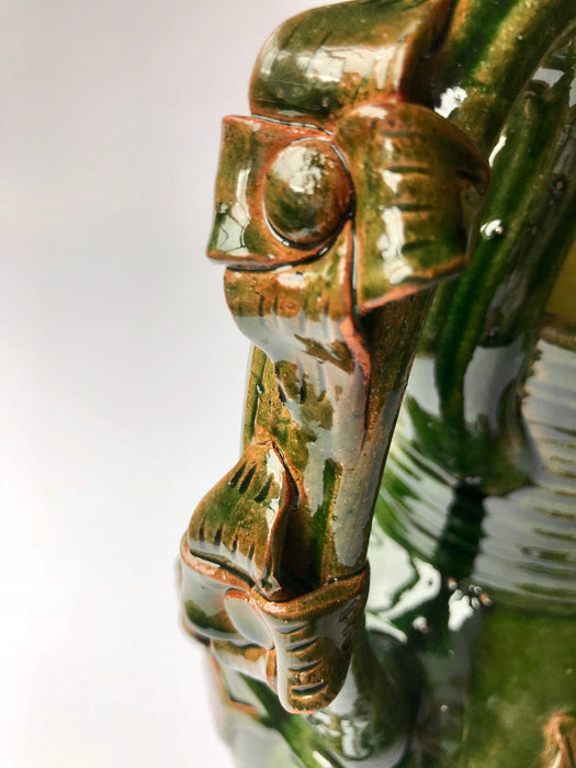 Green Glazed Clay Pitcher with Flower Ornaments