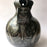 Mexico 1492: A jaguar shaped pitcher (called “cántaro” in Mexico), hand made, hand painted, carefully burnished using the river stones and finished in a fire. The jaguar motif is frequently found in Mexican mythology and ethnic arts, but this one is especially carefully created, and thoughtfully adorned with natural elements like flowers, birds, rain and wings. Used for storing liquids, like water or wine. 