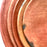 Mexico 1492: An impressive lunch or dessert plate, made from groovy, red clay and marked with random flame spots, adding character. Still showing the line marks of the artisan's work with the quartz stone. Lead free, unglazed. Thanks to the amazing, random pattern of the quartz polish lines and the flame marks, no two pieces are the same. 