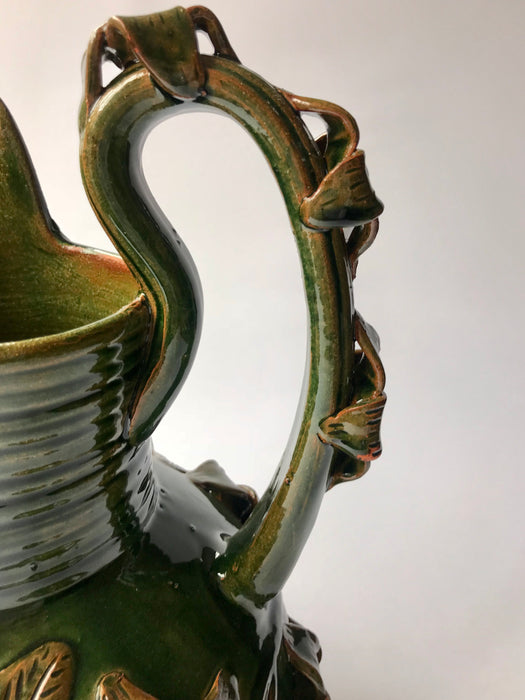 Green Glazed Clay Pitcher with Flower Ornaments