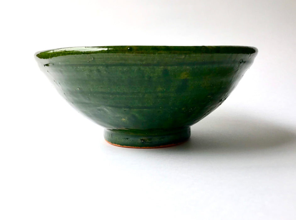 Mexico 1492:  A different mortar: its surface is covered with fine, parallel crease pattern that grinds the food as we pull it while pressing down firmly. Ideal for making green and red salsas, as well as serving guacamole or other appetizers.  With the new, lead-free technique for glazing, we can safely enjoy these beauties today as both decorative and utilitarian pieces. 