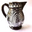 Mexico 1492 - Large, glazed, hand painted pitcher. Black with white drawings of plants and birds. Artisanal work from Guerrero, Mexico. 
