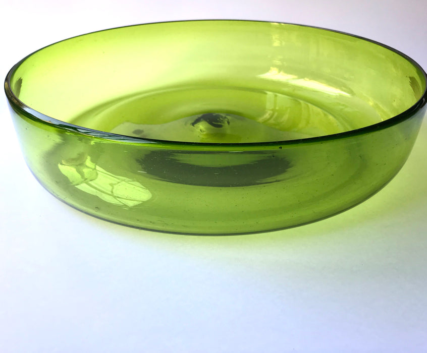 Mexico 1492: Extra generous in size, hand blown salad bowl, made by master blowers of Mexico. Comes in 6 vibrant colors, and a transparent version. Screams party and makes any salad the star course of the meal. Lime Green. 