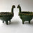 Mexico 1492: Whimsical bird-shaped salsa bowls, with ornaments like flowers or fruit. Made of clay, then bathed in spectacular, world-famous, lead-free green glaze.  With the new, lead-free technique for glazing, we can safely enjoy these beauties today as both decorative and utilitarian pieces. Great for serving salsa, appetizers, dips, marmalade, salt and spices.