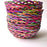 Mexico 1492: Thin wicker strings in many colors flow together and create this cheerful bread basket with a wooden base. Hand made by artisans from Estado de Mexico. 