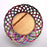 Mexico 1492: Thin wicker strings in many colors flow together and create this cheerful bread basket with a wooden base. Hand made by artisans from Estado de Mexico. 