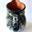 Mexico 1492 - Large, glazed, hand painted pitcher. Black with white drawings of plants and birds. Artisanal work from Guerrero, Mexico. 