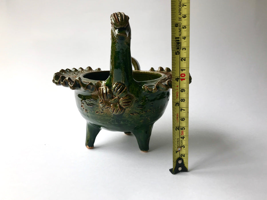 Mexico 1492: Whimsical bird-shaped salsa bowls, with ornaments like flowers or fruit. Made of clay, then bathed in spectacular, world-famous, lead-free green glaze.  With the new, lead-free technique for glazing, we can safely enjoy these beauties today as both decorative and utilitarian pieces. Great for serving salsa, appetizers, dips, marmalade, salt and spices.