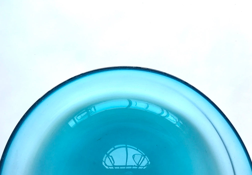 Mexico 1492: Extra generous in size, hand blown salad bowl, made by master blowers of Mexico. Comes in 6 vibrant colors, and a transparent version. Screams party and makes any salad the star course of the meal. Turquoise. 