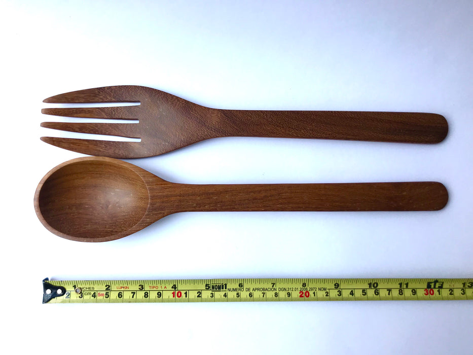 Mexico 1492: Salad utensils, handmade by the talented group of nahua artisans, from the south of Veracruz, Mexico. The spoons and the forks are sanded until smooth. The shiny finish is achieved using the beeswax. No varnish or artificial sealer are used.
