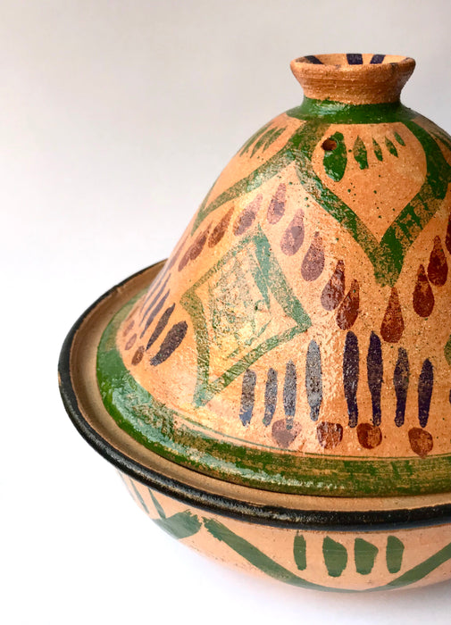 Mexico 1492: What happens when a traditional Morroccan clay dish gets transformed by warm, colorful, unstoppable Mexican creativity? Don Abel y doña Matea created a cultural fusion of Mexico and North Africa, so beautiful and imaginative. Traditional tajine, the predecessor of the modern crock pot, embellished by the talent and skill of the amazing Oaxacan artisans.  Handmade, painted and lead-free glazed in Oaxaca, Mexico.  Version: Green Maguey.