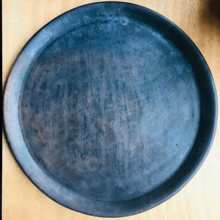 Mexico 1492 - Thick brown clay plates, with uneven, unpredictable patterns of smoke stains, that can just leave a light shade or cover the plate completely.