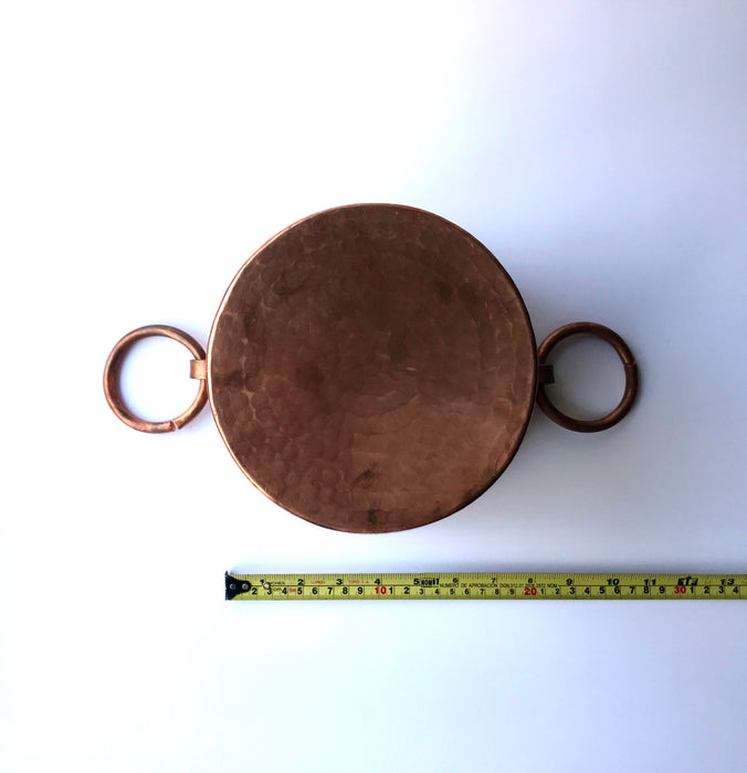 Mexico 1492: Copper ice-bucket, hand made by the master coppersmiths of Michoacán, through carefully hammering its surface until achieving perfection. 