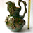 Green Glazed Clay Pitcher with Flower Ornaments