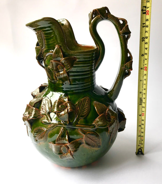 Green Glazed Clay Pitcher with Flower Ornaments