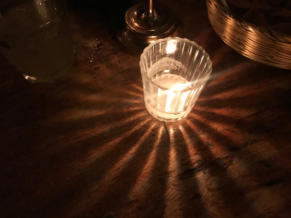 Mexico 1492: the molds like these are used as candle holders. We were lucky to find these made out of mango wood, with 12 cone-shaped holes each and a very smooth finish.   Available with or without candles and glasses. 