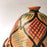 Mexico 1492: What happens when a traditional Morroccan clay dish gets transformed by warm, colorful, unstoppable Mexican creativity? Don Abel y doña Matea created a cultural fusion of Mexico and North Africa, so beautiful and imaginative. Traditional tajine, the predecessor of the modern crock pot, embellished by the talent and skill of the amazing Oaxacan artisans. Handmade, painted and lead-free glazed in Oaxaca, Mexico. Version: Black Agave.