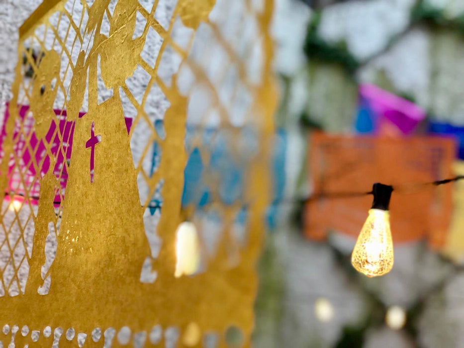 Mexico 1492: Garland of 10 banners of papel picado on a 5m (16ft) long string, with Día de Muertos (Day of the Dead) theme. Each garland carries 10 different colors and designs with the same Day of the Dead theme: skeletons carrying coffin, dancing, riding a horse or a bike, as mariachi, with cake, on a wedding, at the altar… A magnificent, colorful, so typical ornament that may be one of the most recognizable Mexican symbols today, was created and still handmade in the state of Puebla.