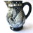 Mexico 1492 - Large, glazed, hand painted pitcher. Black with white drawings of plants and birds. Artisanal work from Guerrero, Mexico. 