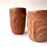 Mexico 1492: Stunning shot glasses with Zapotec profile-shaped ornaments, made from red clay and marked with random flame spots, adding character. Excellent for serving tequila or mezcal. Lead free, unglazed. Thanks to the handmade nature and the flame marks, no two pieces are the same, or even of the same height, which adds a lot of charm and informality. 