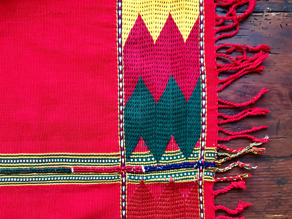 Mexico 1492 - bright red table cloth with colorful edges, handmade on a backstrap loom in Chiapas Mexico. Fringes and borders. 